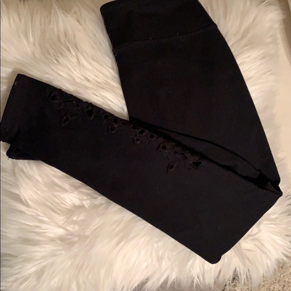 Fabletics leggings with floral design on left leg - Picture 1 of 3